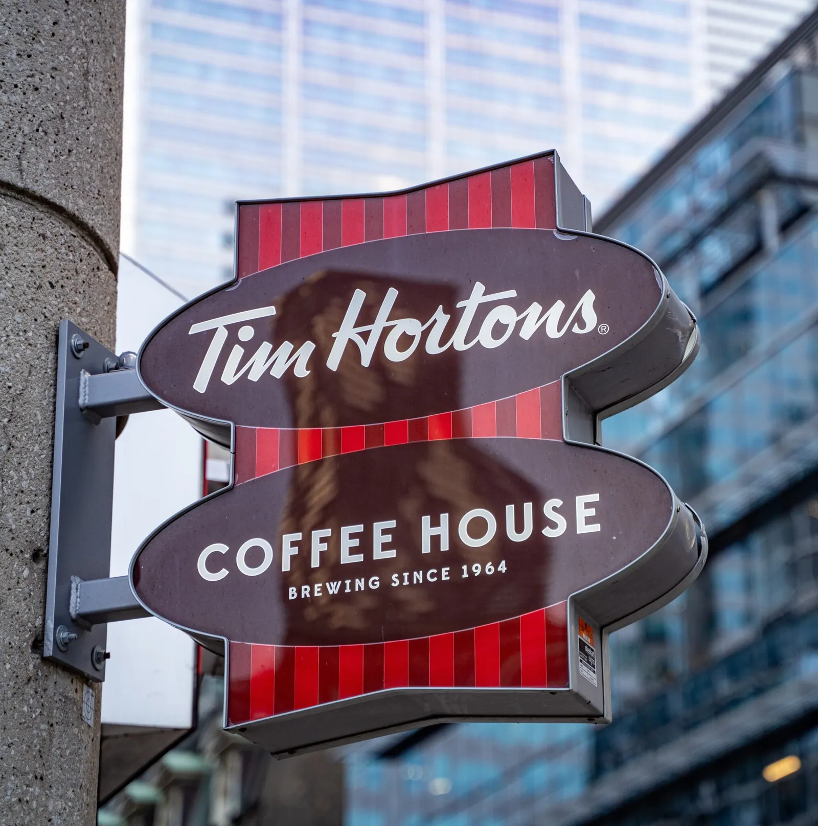 Tim Hortons coffee house sign on a downtown storefront we service
